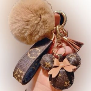 Keychain with puff ball and mini mouse attachment